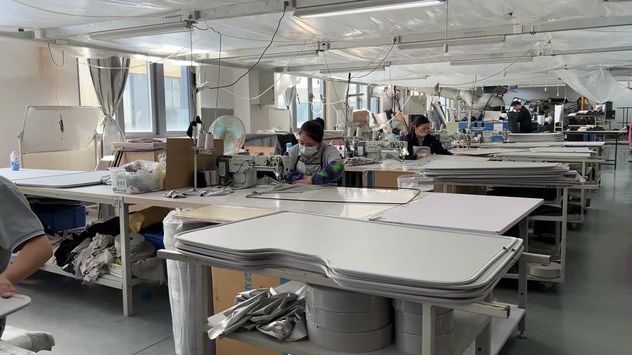 Real workshop sewing and preparing Tesla sunshade panels